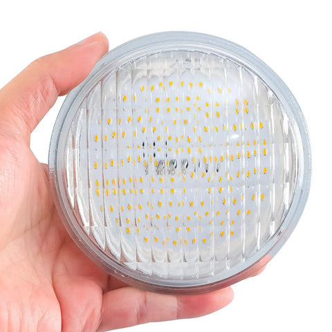 Hand holding a PAR36 LED Landscape Bulbs 6W 700 Lumens Warm White 3000K Low Voltage 12V AC DC for Outdoor Tractor Lighting