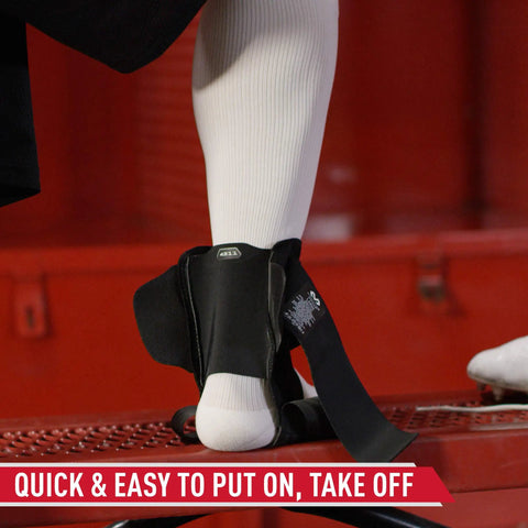Stealth Lace-Free Ankle Brace For Left Or Right Ankles, Ultra Lightweight Support, shown on foot, red background, HSA Eligible.