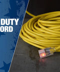 Heavy Duty Outdoor Extension Cord 12 Gauge 100 Feet With Lighted End, Weatherproof SJTW, coiled yellow on concrete surface