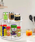 Two Tier Lazy Susan Turntable Organizer For Bathroom And Vanity, Clear 9.25 Inch Rotating Makeup Organizer with spices on counter