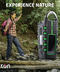Rugged Multipowered Portable Emergency Weather Radio And Flashlight With Hand Crank Solar Power USB Smartphone Charger shown outdoors
