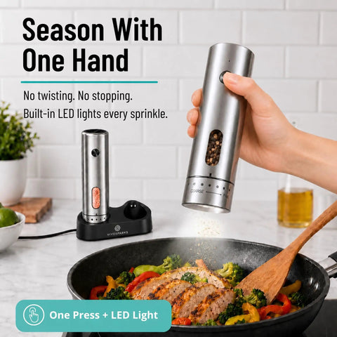 One Hand Press Electric Salt And Pepper Grinder Set With Charging Base Auto Seasoning Tool For Cooking Easy Use No Twisting Wrist Relief Cordless Rechargeable Kitchen Gadget in use above a skillet.