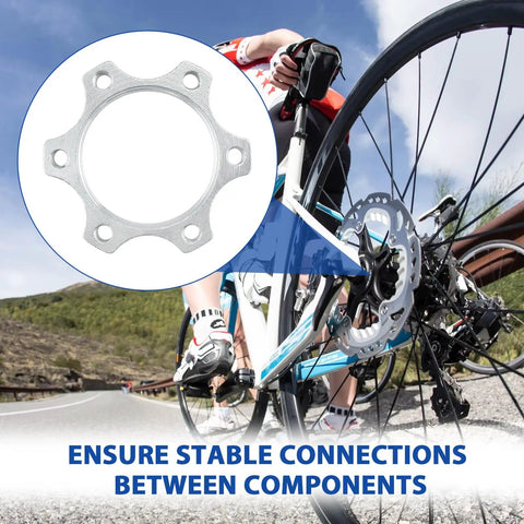 Cyclist installing 4 Pack 44mm Disc Brake Adapter For Bicycle Hubs To 6-Bolt Rotors, Aluminum Alloy Flange, 1.73 Inch, Silver