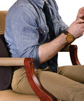Premium Lumbar Support Pillow For Chair With Ergonomic Contoured Foam Insert Designed To Ease Lower Back Pain And Improve Posture on a desk chair.
