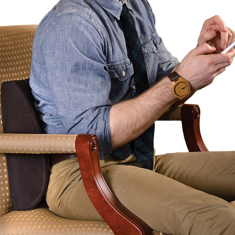Premium Lumbar Support Pillow For Chair With Ergonomic Contoured Foam Insert Designed To Ease Lower Back Pain And Improve Posture on a desk chair.