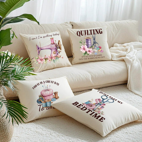 Decorative pillows with quilting designs on a cream sofa, featuring humorous sewing quotes and colorful illustrations.