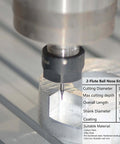 Close-up of SpeTool carbide ball-nose end mill with TiAlN coating, 1/32 in dia, 1/8 in shank, cutting metal