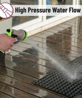 Stainless Steel Garden Hose With 10 Function Spray Nozzle, 100 Ft No Kink Metal Water Hose, spraying water on wooden deck mat