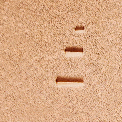 Close-up of leather with impressions from Double Beveler Stamp Set For Leathercraft, 3 Piece Pro Grade Stainless Steel Bevelers.