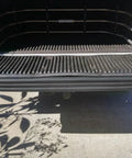 ECOTRIC tailgate molding cap installed on Ford F-150 tailgate; black ribbed plastic trim along the open bed edge