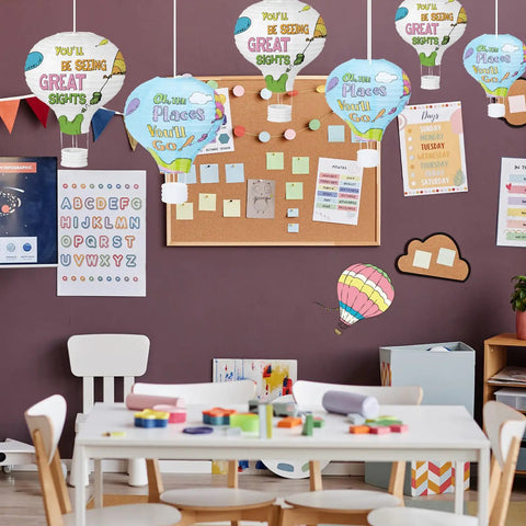 Oh The Places You’ll Go Themed 12 Inch Hot Air Balloon Paper Lanterns 8 Pack Totally Dope Graduation Party Decor hanging in classroom