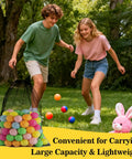 Children playing outdoors with a nylon net bag filled with colorful balls, showcasing the 7 Pack Colorful Mesh Drawstring Bags 18x12 Inch Breathable Nylon Net Storage For Travel Gym Home And Everyday Carry Essentials Heavy Duty Lightweight Organizer With Drawstring Closure For Sports Gear Toys And More.