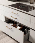 Modern kitchen with Champagne Bronze Cabinet Pulls 5 Inch 128mm 10 Pack Cupboard Handles installed on white drawers