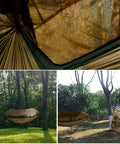 Cozy Double Camping Hammock With Bug Net For Outdoors Hiking And Travel Built Tough For Real Life 500 Lbs Capacity Ultra Durable 210T Nylon Parachute Fabric Fits Two People Khaki And Green hanging between trees.