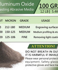 100 Grit Aluminum Oxide Sand Blasting Media For Metal Surfaces Pro Grade Heavy Duty Long Lasting High Hardness Abrasive Powder For Industrial Sandblasting 12 Lb Bag with safety warning.