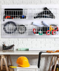 Four Piece Metal Slatwall Baskets And Bins Set For PVC Slatwall Garage Panels holding various tools and accessories, white finish
