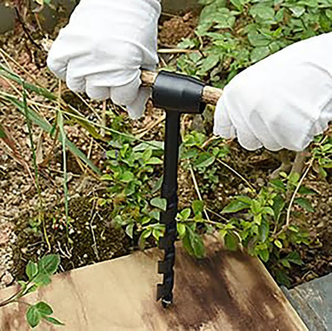 Using 4 Pcs Hand Auger Wood Drill Set With Scotch Eye Wrench for bushcraft and survival, portable camping gear in outdoor setting.