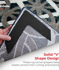 Hands showing V Shape Rug Corner Grippers 4 Pack for Indoor and Outdoor Rugs with easy install on patterned carpet.