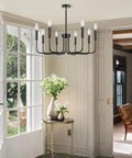 Killer 8 Light Black Chandelier With Dang Sharp Matte Finish For Farmhouse Dining Room And Kitchen Island, adjustable height in modern setting.