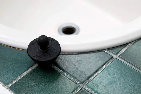 Universal Drain Stopper For Bathtub And Sink Your Go To Two Pack Black Plug Fits Most Drains Easy To Use on green tile near sink