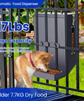 Real Deal Automatic Dog Feeder Hanging Pet Cage Food Dispenser Holds 17 Pounds For Big Packs And Multi Pet Homes Quick Setup Gravity Bowls For Easy Daily Grind with a dog eating dry kibble.