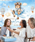 Airplane Baby Shower Banner With Little Explorer Vibe And Hot Air Balloons Boy Shower Backdrop 6 By 3 Point 6 Ft Photo Background Easy Hang Decor For A Fun Kid Friendly Party featuring women seated with gift box.