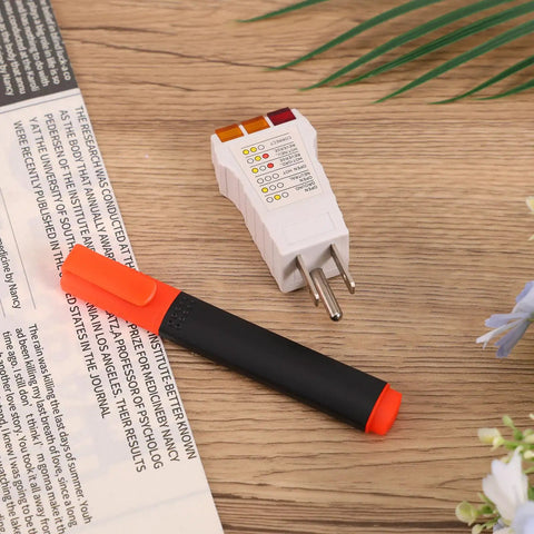 Grounding Tester Kit Conductivity Pen And Outlet Continuity Tester Electrical Gear for home use on wooden surface