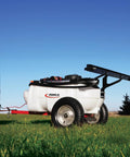 15 Gallon Trailer Sprayer With 2 Nozzle Boom, 1.2 GPM High Flow Pump, 60 PSI, on grass with clear sky