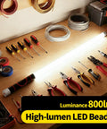 Flexible 30 Inch LED Light Stick Rechargeable Bendable Work Light With Three Modes placed on workbench with tools