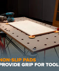 Centipede Panel Cutting Accessory Kit Fits All Centipede Work Stands With 4 X Cups 4 Quick Clamps 6 Non Slips And 2 Hooks Turns Any Portable Table Into A Pro Cutting Station For Sawhorse And Folding Table Applications shown in use on a table with non-slip pads