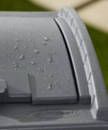Close-up of Hideaway Outdoor Trash Can With Lid, Resin Waste Container For Patio Garden Deck, weather-resistant lid detail