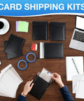 All In One Trading Card Shipping Kit With 60 Bubble Mailers And 120 Card Protectors, 60 Self Sealing Bags on a desk with accessories