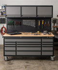 Heavy Duty Rolling Tool Chest Featuring 14 Lockable Drawers And Three Secure Cabinets Built For Serious Garage Organization And No Nonsense Shop Stash with tools and pegboard.