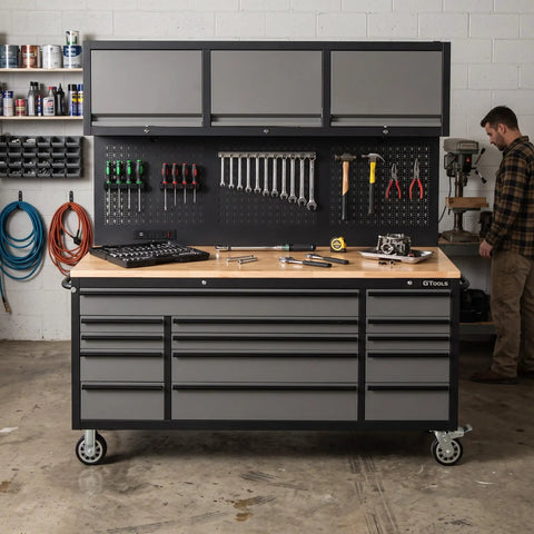 Heavy Duty Rolling Tool Chest Featuring 14 Lockable Drawers And Three Secure Cabinets Built For Serious Garage Organization And No Nonsense Shop Stash with tools and pegboard.