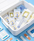20 Pack Disposable Urine Bags For Kids With Adhesive Surface in open container, showing measurement scale and packaging details.
