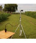 Elele 9-Element Yagi Antenna For Amateur Radios, 1260-1300 MHz Band, mounted on a tripod with coax cable outdoors