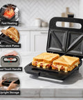 Ovente Electric Sandwich Maker With Quick Heating Non Stick Plates For Toasting Paninis And Omelets Perfect Hot Pressed Breakfast Grill Machine In Sleek Black Finish, showcasing sandwiches on non-stick plates.