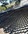 Permeable Gravel Ground Grid Driveway Stabilization System Paver installed on a slope for ground stabilization and drainage
