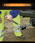 5 Ton Dual Gear Power Puller with 3 Hooks attached to a vehicle for heavy duty lifting with steel cable and anti-slip handle