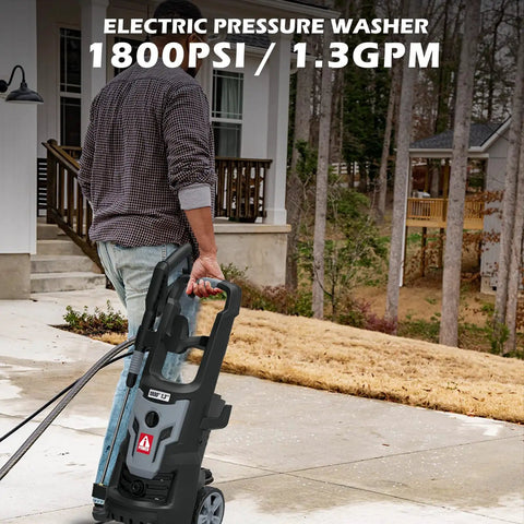 Man using Beast Mode Electric Pressure Washer 1800 PSI With 1.3 GPM, Quick Connect Spray Gun And Wand on driveway