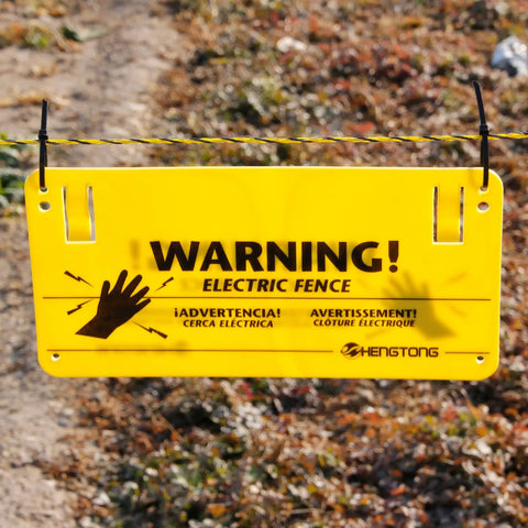 Electric Fence Warning Sign Set 4 Pack Yellow No Touching Safety Signs 9.5 By 4.7 Inches Durable Plastic mounted on fence