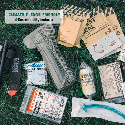 Top-down view of Rhino Rescue IFAK trauma kit with C-A-T tourniquet in black MOLLE pouch and assorted first-aid supplies