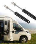 2 Pack Black Gas Spring Lift Supports And Struts For Rv Car Truck Window Cabinet Door Covers Straight Up Built Tough With Zero Sweat Swaps 4 Inch 5lb 22N Universal Replacement next to RV by the beach
