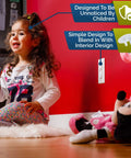 Child playing near 32 Pack Outlet Covers For Baby Proofing Easy Install Socket Protectors White To Prevent Electrocution And Keep Toddlers Safe In Home And Office Perfect For Nursery And Kid Friendly Rooms With No Tool Quick Setup