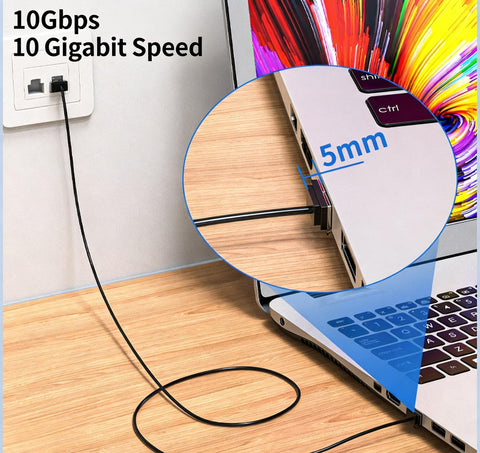 Close-up of laptop connected to wall using 2-Pack Cat6 Ethernet Cables, Ultra Slim Flat Patch Cord, 15cm Short Length, 5mm connectors.