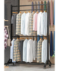 Mobile 2/3 Tier Metal Clothes Hanger And Fabric Curtain Sample Display Rack With Wheels displaying shirts