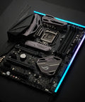 Neon Digital RGB LED Strip M1 1 Meter Flexible Mounting Full Color Range illuminating a black gaming motherboard top view