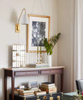 Modern Brass Plug In Wall Sconces Set Of Two With Fabric Shade And Pull Chain Switch on wall near decorated table