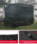 Universal Heavy Duty Golf Cart Cover For 2 And 4 Seater Carts Weatherproof Water Resistant Windproof UV Shield With Storage Bag Fits EZGO And Club Car 2 And 4 Passenger Models Black shown in stormy weather with elastic band and windproof strap details.