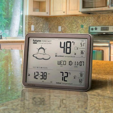 Self Learning Forecast Wireless Weather Station With Big Display And Atomic Clock For Indoor Outdoor Temperature, Real Time Readings, Trend Arrows And No Brainer Forecast Tech In Black on kitchen counter
